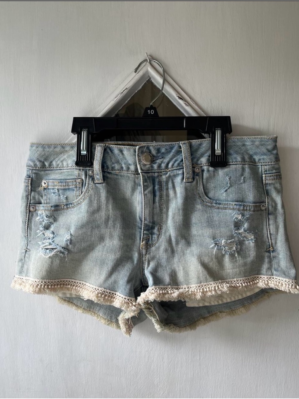 American Eagle Outfitters Light Wash Distressed Denim Shorts with Lace Hem